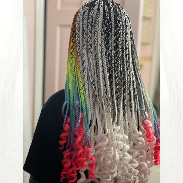 Keanna wearing braids in Neon Rainbow and Pure White