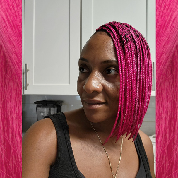 Malisha wearing braids in Berry Pink, Pink Crush, and Turkish Delight