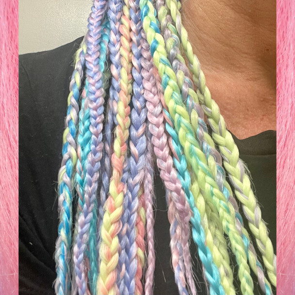 Alfie wearing braids in Candyfloss, Mojito, Sea Lavender, Sky Blue, and Unicorn