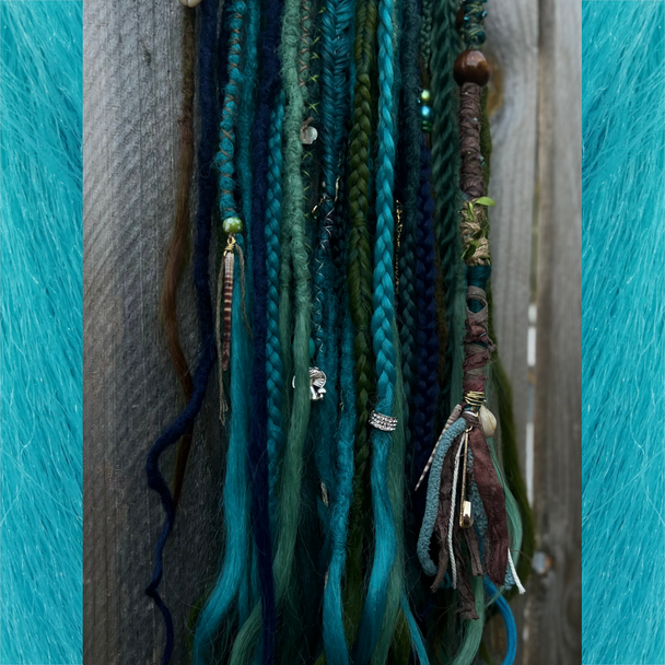 Synthetic dreads and braids made by Loveslavishlocks in Fern, Light Pine, Myrtle Green, Lagoon Blue, Night Sky, Olive Green, and Tropical Blue