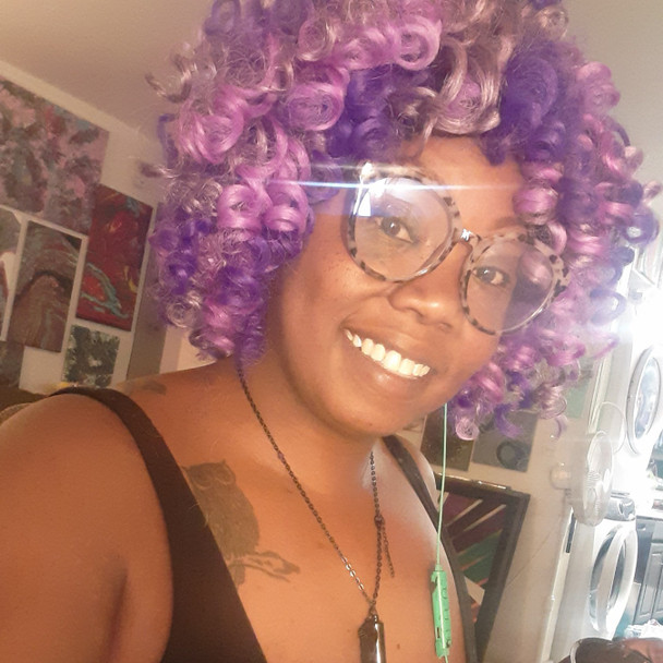 Chanece wearing curls made from M.Purple Fantasy, M.Tropical Berry, Orchid, and Purple