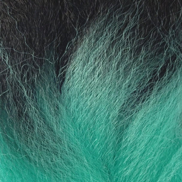 Close-up of the transition from black to wintergreen for RastAfri Highlight Braid, 1B Off Black with Wintergreen Tips