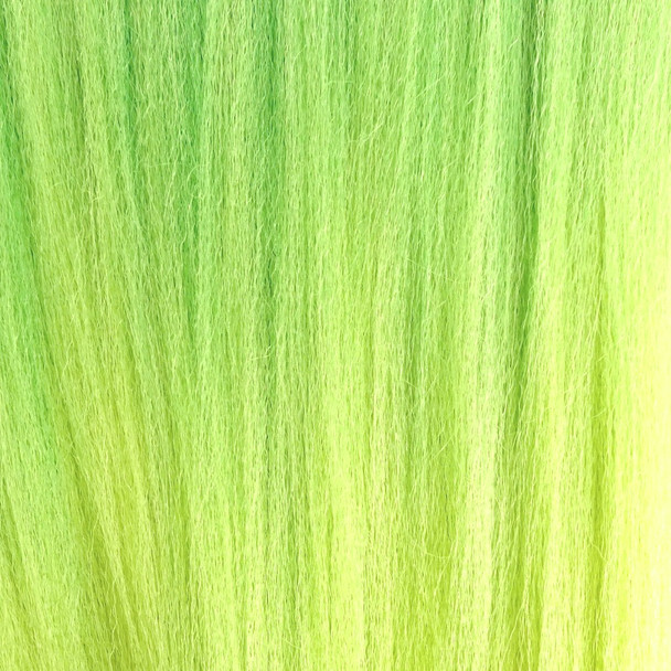 Close-up of the transition from blended to solid green for RastAfri Pre-Stretched Amazon 3X Braid, 3T/Green Swamp