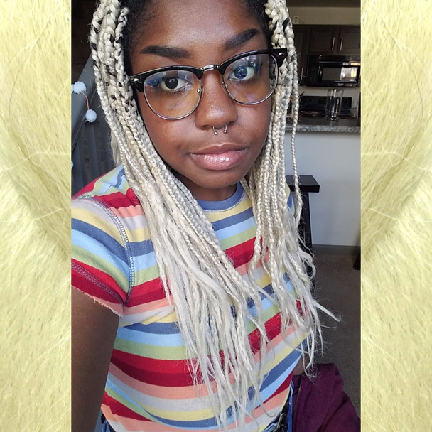 Zekeya wearing braids in 613 Platinum Blond