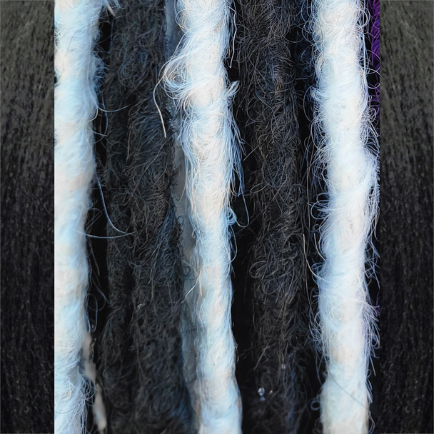 Dreads made by Savanna in 1 Black, Pure White, and Snow White