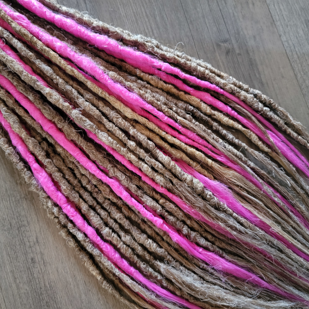 Dreads made by Candida in Pink Crush, Seashore, and Seashore Ombré
