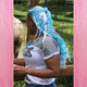 Jawaya wearing glow in the dark braiding hair, Festival Braid in Light Pink,  and kk jumbo braid in Periwinkle Blue and Sky Blue