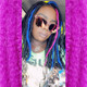 Roshonda wearing marley braid in Navy Blue, Neon Violet, and Neon Yellow