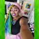 Momo Pixel wearing Turquoise, Purple, Cobalt Blue, Yellow, Lime Green, Sky Blue, and Seafoam Ombré braids.