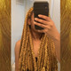 Chloe wearing braids in 30/144 Honey Moon, 144 Gold, and Goldie