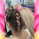 Gianna wearing a braided ponytail in Peachy Keen