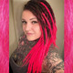 Synthetic dreads made by DreadNaughty LLC in Strawberry