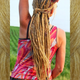 Dreads made by Dreadnaughty LLC in 27/613 Mixed Blond