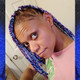 Jewelz wearing braids in Cobalt Blue, Periwinkle Blue, Sapphire Blue, Highlight Braid in 1B with Navy Blue Tips, Glow Braid in White Cotton Candy, and Festival Braid in Amethyst and Neon Purple