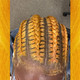 Makayla wearing braids in Burnt Orange