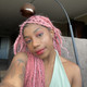 Kymea wearing braids in Dusty Rose and English Rose