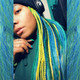 Hen wearing braids in Bright Petrol Green, Cobalt Blue, Jungle Green, Lemon Lime Ombré, and Light Petrol Green