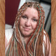 Brooke wearing synthetic dreads made from Fern, Persian Orange, Rustic Red, and Silver Blond