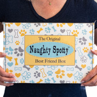 The Original Naughty Spotty™Best Friend Box features a brightly colored teal and yellow gift box decorated with bones and is fully shrink-wrapped.