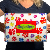 The Naughty Spotty™ Best Friend Box with Pink Skull Treat Dispenser comes in a beautiful gift box, shrink-wrapped, featuring brightly colored dog paw prints.