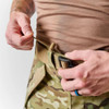 Close up of the drawstring waist with cord lock for secure fit over other layers