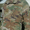 Close up of the front pockets on the combat uniform shirt 