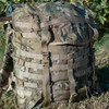 MultiCam OCP MOLLE II Rucksack standing up in the grass