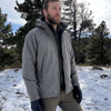 Model outside in the snow wearing the Patagonia PCU level 6 Gore-Tex Jacket, U.S. Issue