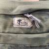view of the JBC label sewn on to the Medical Fanny Pack Kit