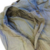 A vintage olive drab green cotton US military M-1945 mummy-style sleeping bag cover closeup, unsnapped
