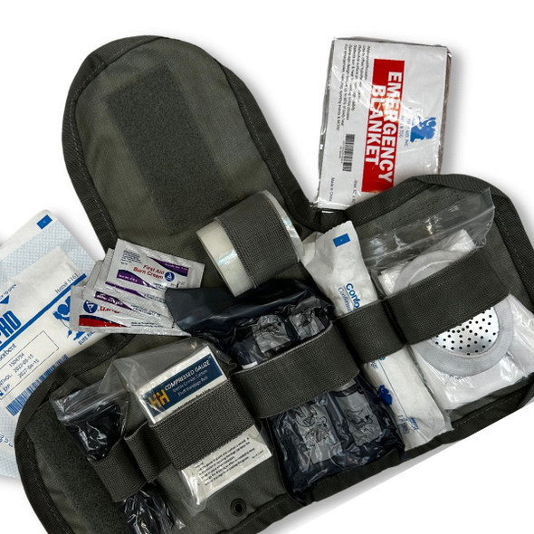 First Aid Field Kit with MOLLE pouch with contents inside the pouch First Aid Field Kit with MOLLE pouch with contents inside the pouch