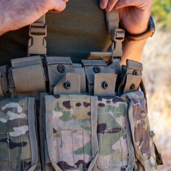 Man holding the straps on the MultiCam Tactical Assault Panel (TAP) Complete Man holding the straps on the MultiCam Tactical Assault Panel (TAP) Complete