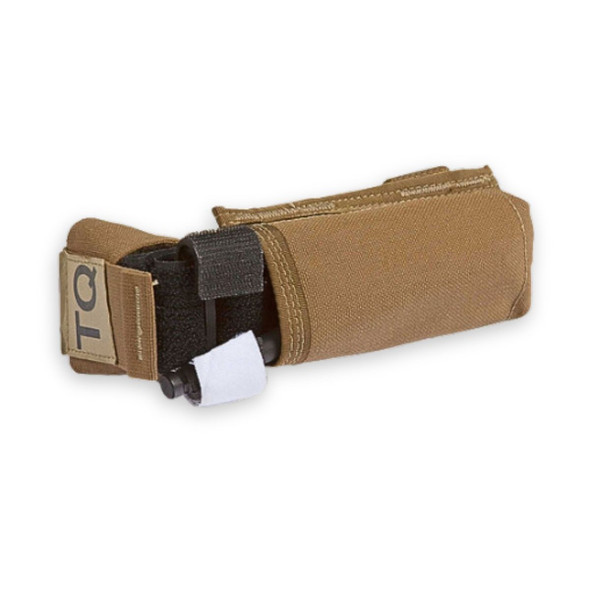 A genuine black North American Rescue Gen 7 CAT tourniquet inside its rugged khaki MOLLE-compatible tactical holder