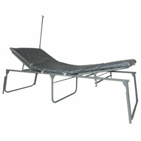 A gray medical-grade special needs cot with an adjustable propped-up headrest, an elevated leg section, a gray vinyl mattress, and an attached silver IV pole.