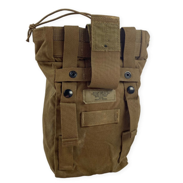 the back of the Coyote USMC issue dump pouch showing the attachment straps and hook and loop quick release the back of the Coyote USMC issue dump pouch showing the attachment straps and hook and loop quick release