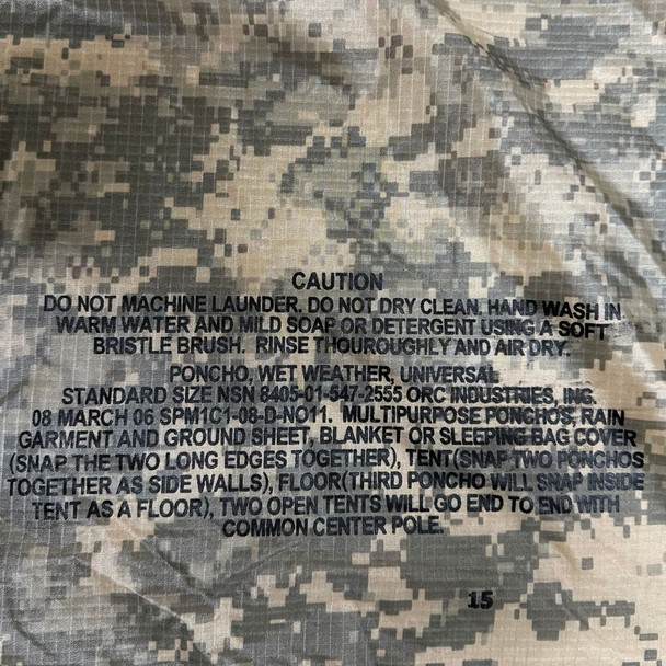 US issue stamp on rip stop waterproof interior of the acu issue poncho