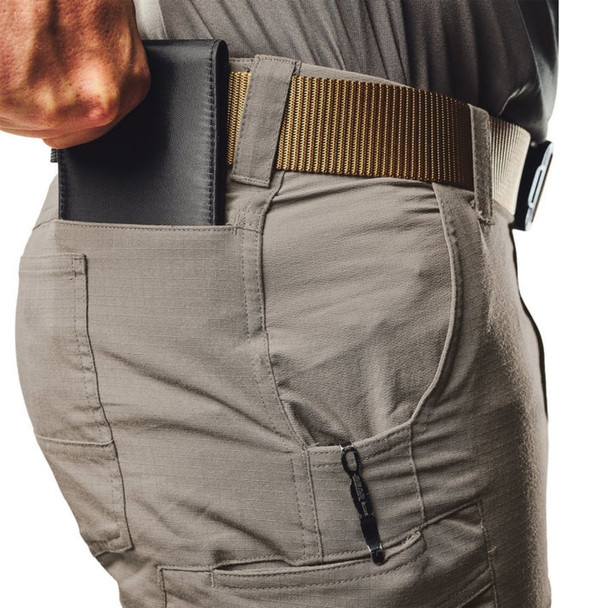 Model putting a wallet in the third pocket 