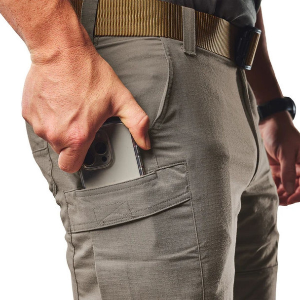 Model putting a cell phone in the pocket 