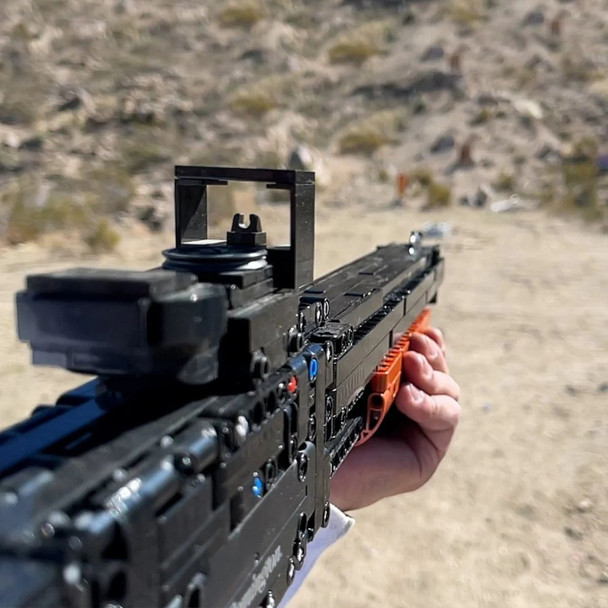 Caliber Building Blocks Shotgun pointing down at the road outside 