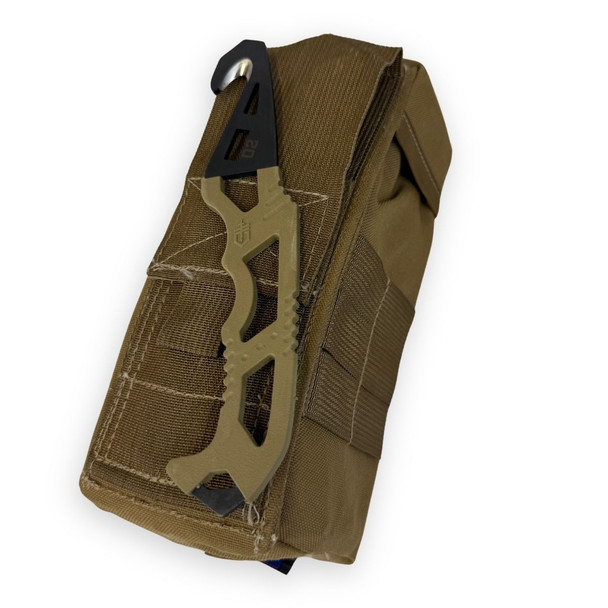 cutter laying on top of the pouch 