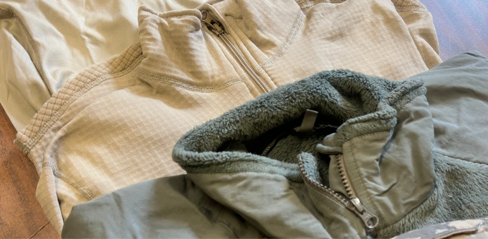 Folded cold weather fleece and base layers