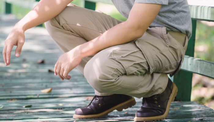 bdu special person kneeling in a pair of pants
