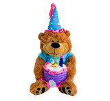A brown happy birthday teddy bear with a cake on his hands.