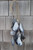 Mussel shell tassel on wall