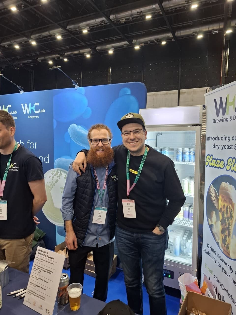 Two friends at a stand in Liverpool