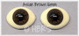 The sclera (white) are not tinted yellow.  I can't fix the photo.  They are bright white as normal.