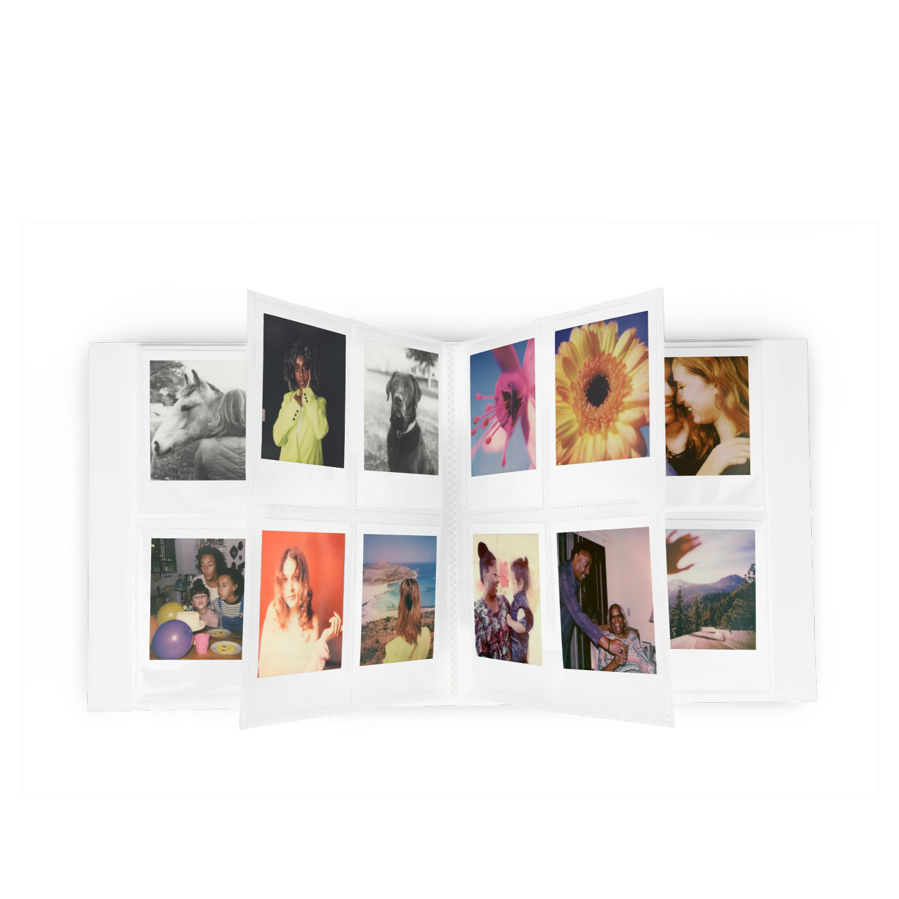 Depicted is an open view of the large white Polaroid photo album.