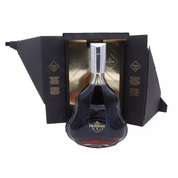 Bottle of Hennessy XXO Cognac 1000ml showcasing its amber hue