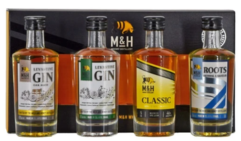 Milk & Honey Gift Set featuring four 50ml bottles of Israeli whisky, gin, and herbal liqueur