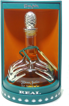 Bottle of Don Julio Real tequila 750ml showcasing its golden hue